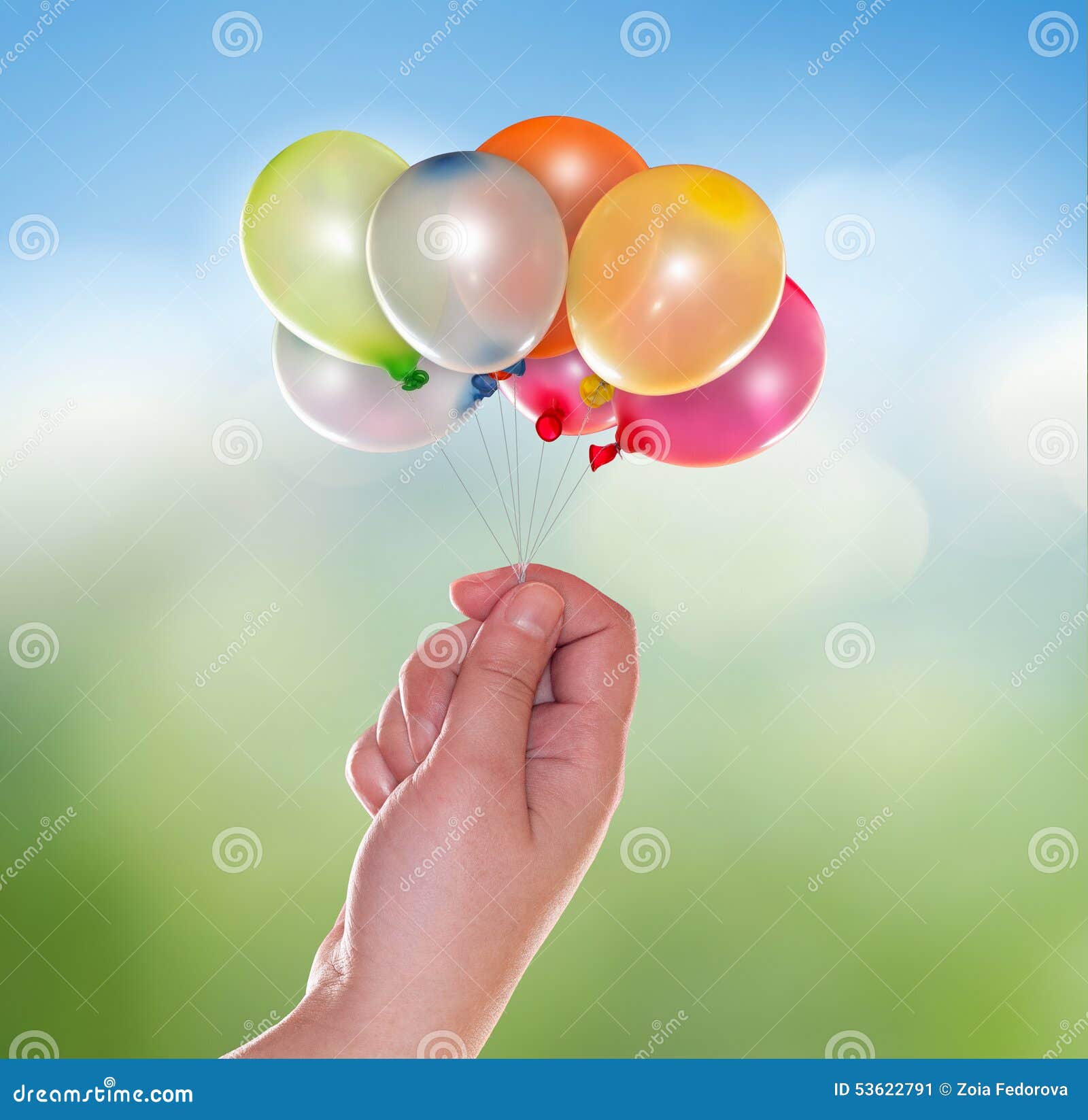 Hand with balloons stock image. Image of green, celebration - 53622791