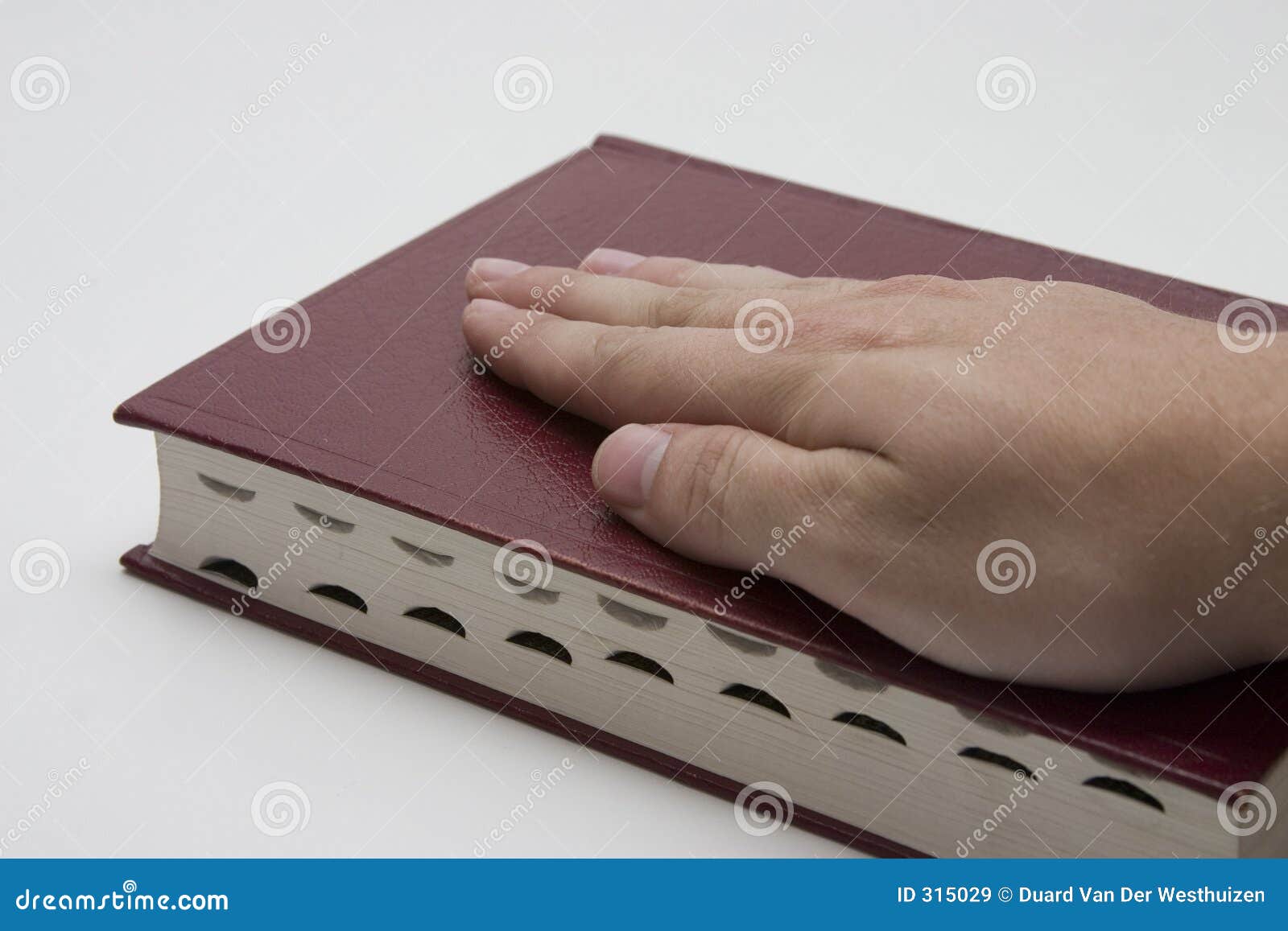 hand on a bible hand on a bible