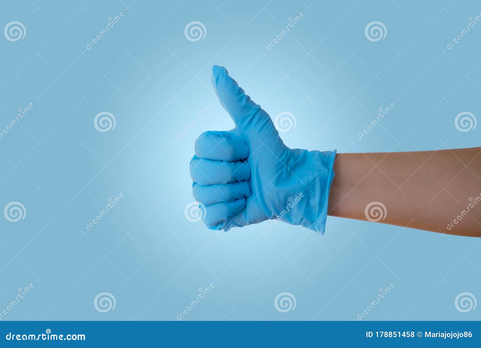 hand with blue latex glove
