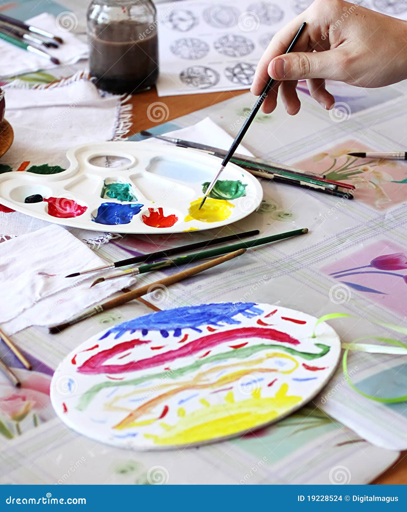 Hand with brush drawing stock photo. Image of creativity 19228524