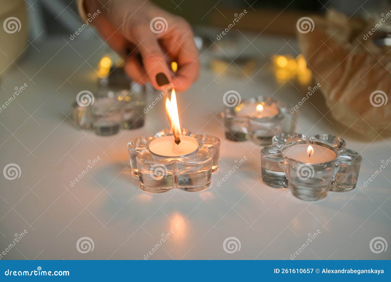 A Hand with a Burning Match Lights a Candle Stock Image Image of