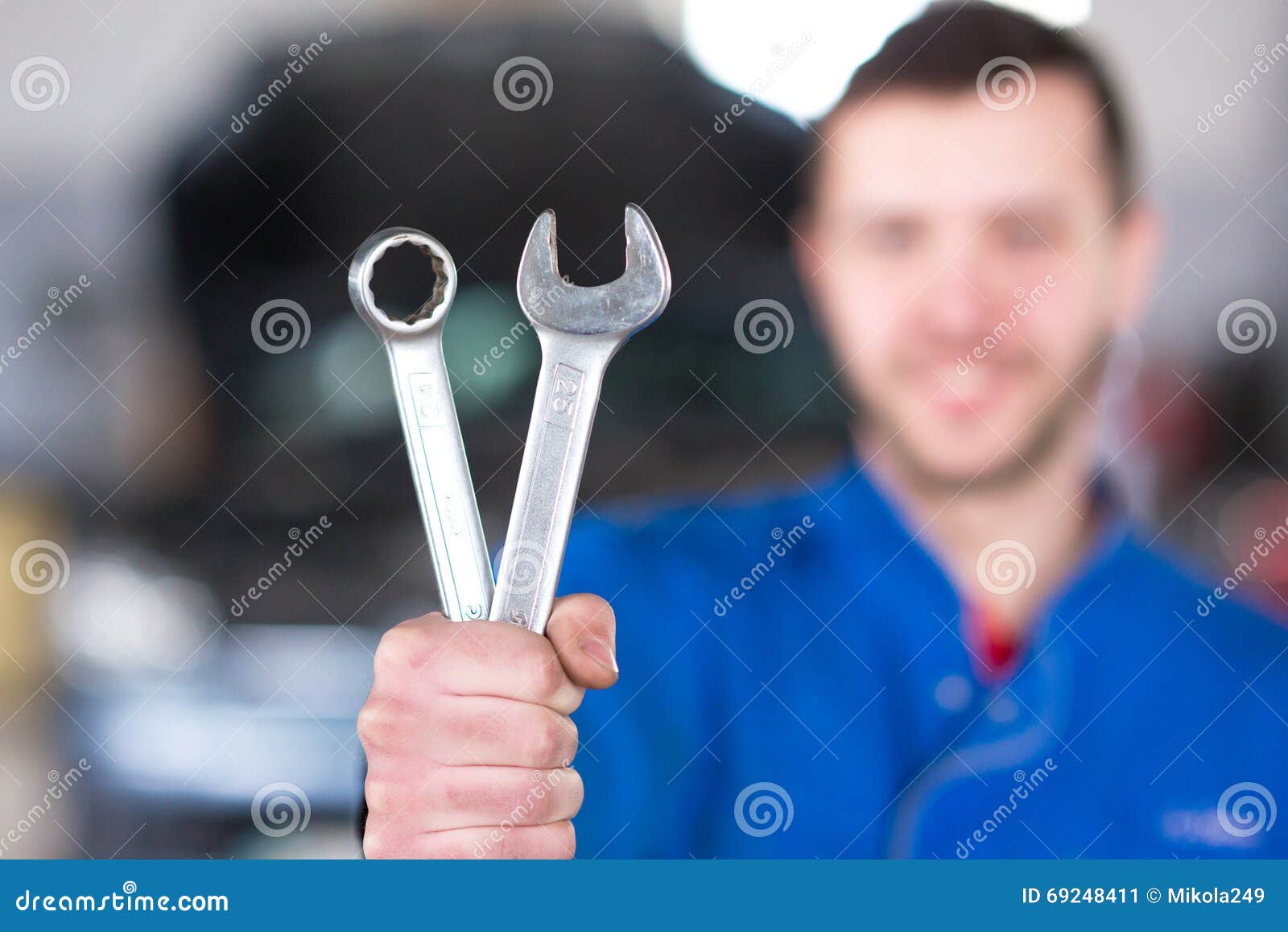 Hand of Car Mechanic with Wrench. Stock Image - Image of garage ...