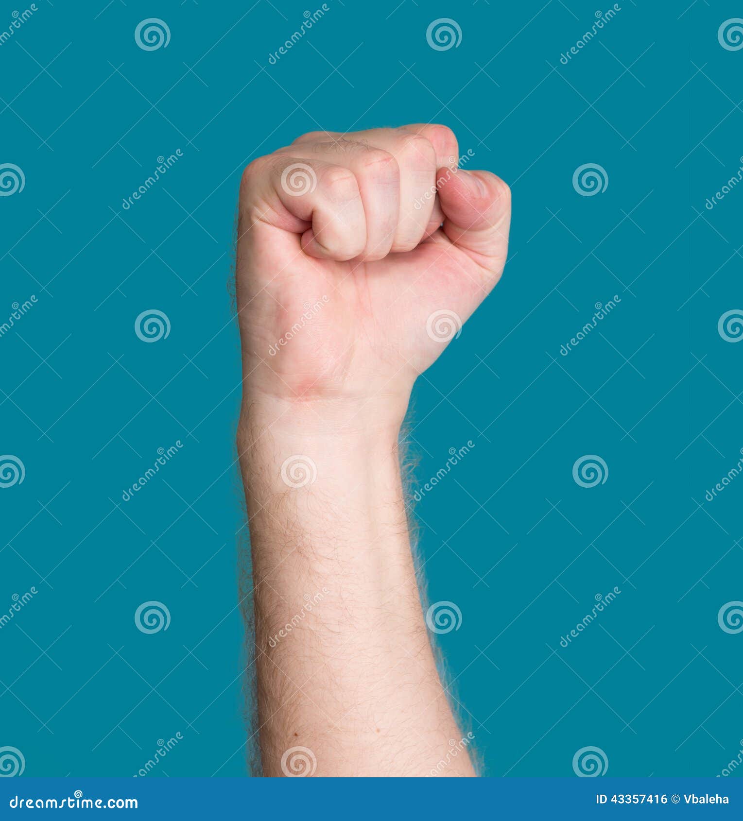 Hand with clenched fist stock photo. Image of conflict 43357416