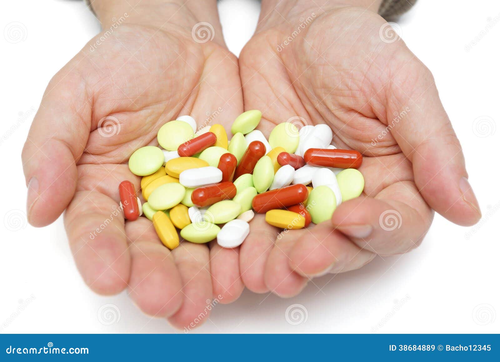 Hand with colorful pills stock image. Image of pharmaceutical 38684889
