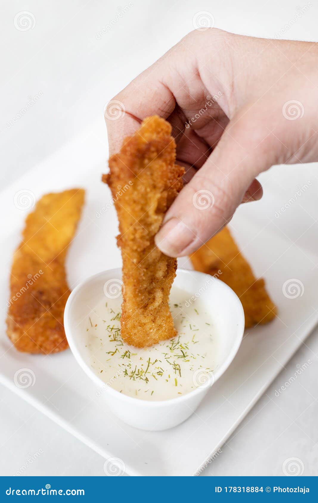Hand Dip Fried Chicken in Dill Sauce Above White Marble Table Background Stock Photo Image of