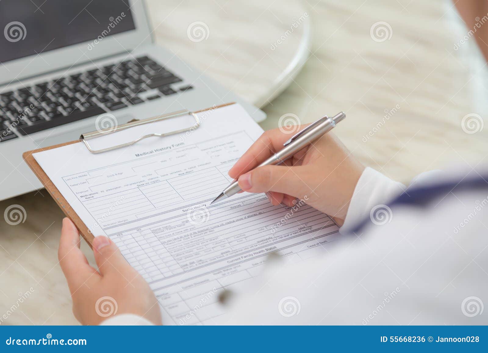 Hand of doctor writing stock photo. Image of closeup - 55668236