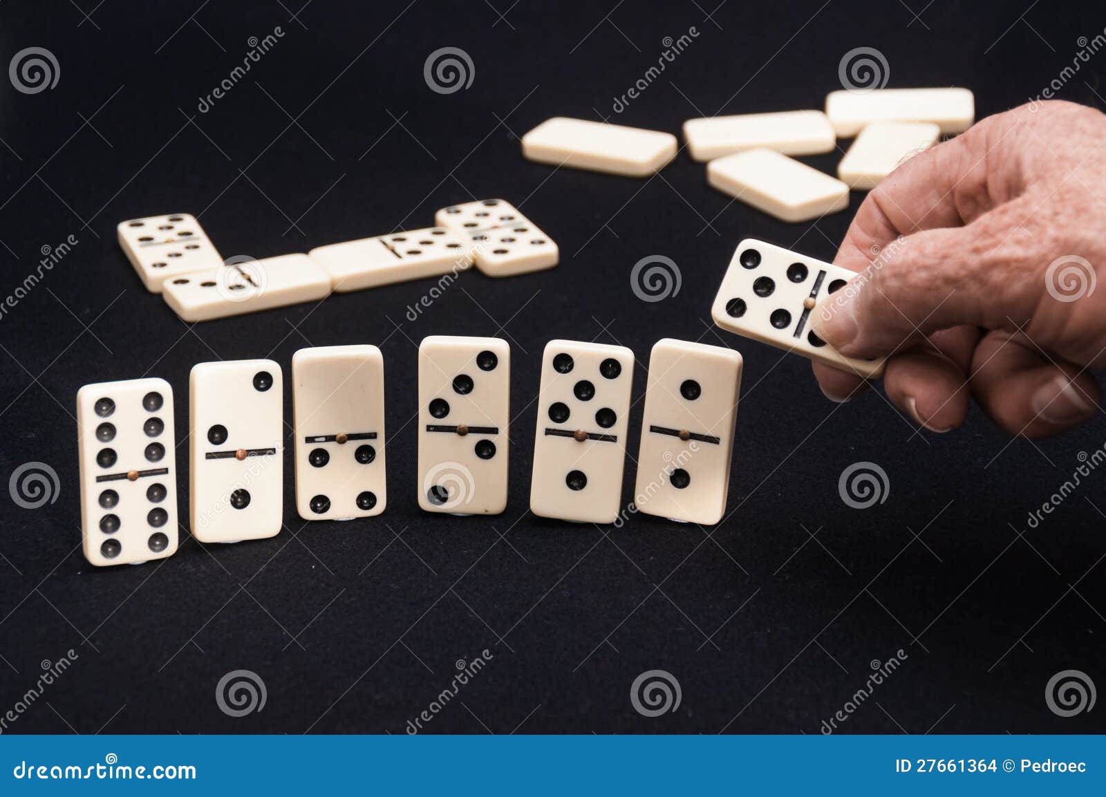 A hand of dominoes stock photo. Image of play, entertainment - 27661364