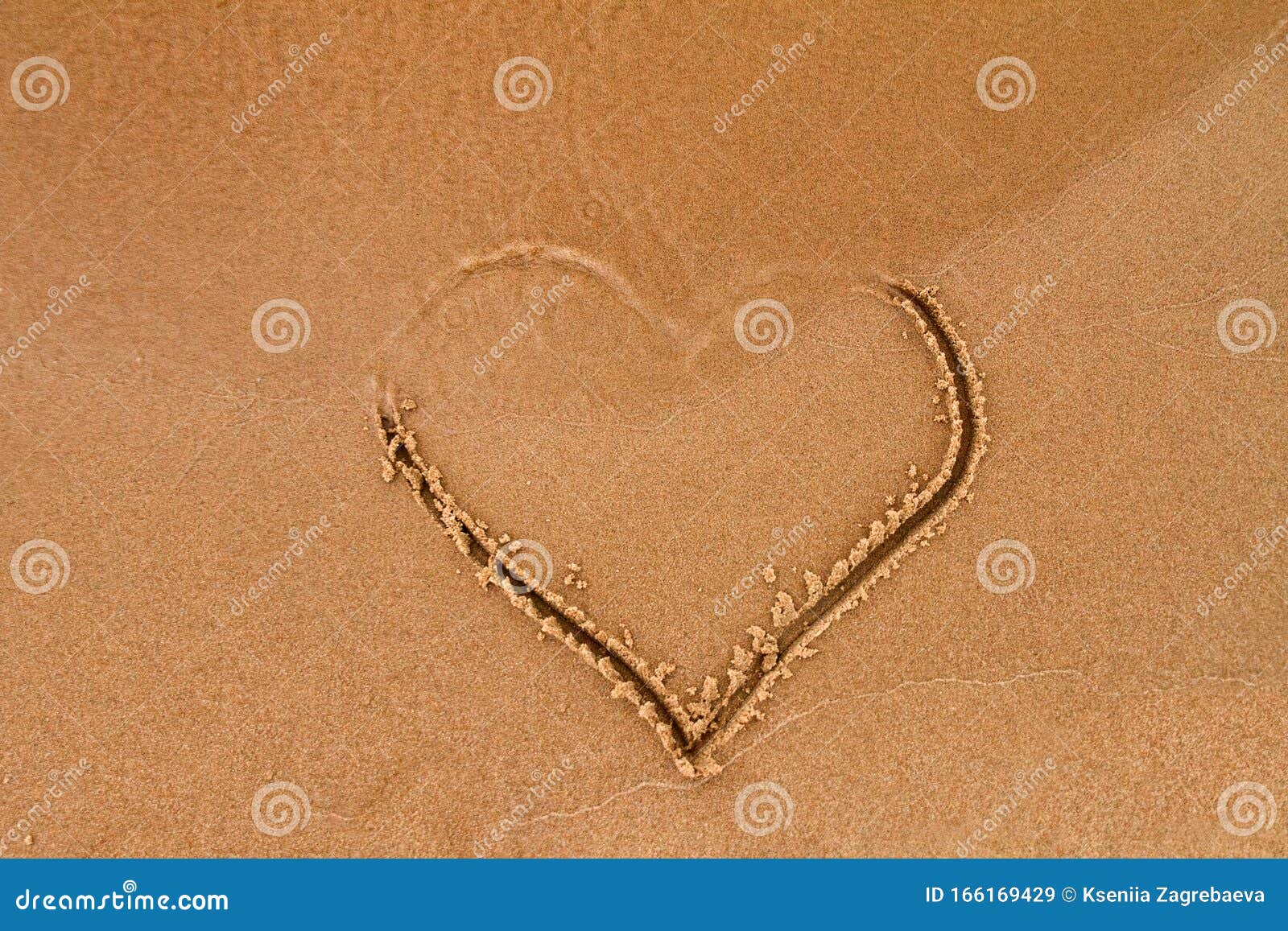 Hand Drawn Heart Shape On Wet Yellow Sand Covered By A Wave Of The Sea And Washed Away Stock Image Image Of Parting Feeling