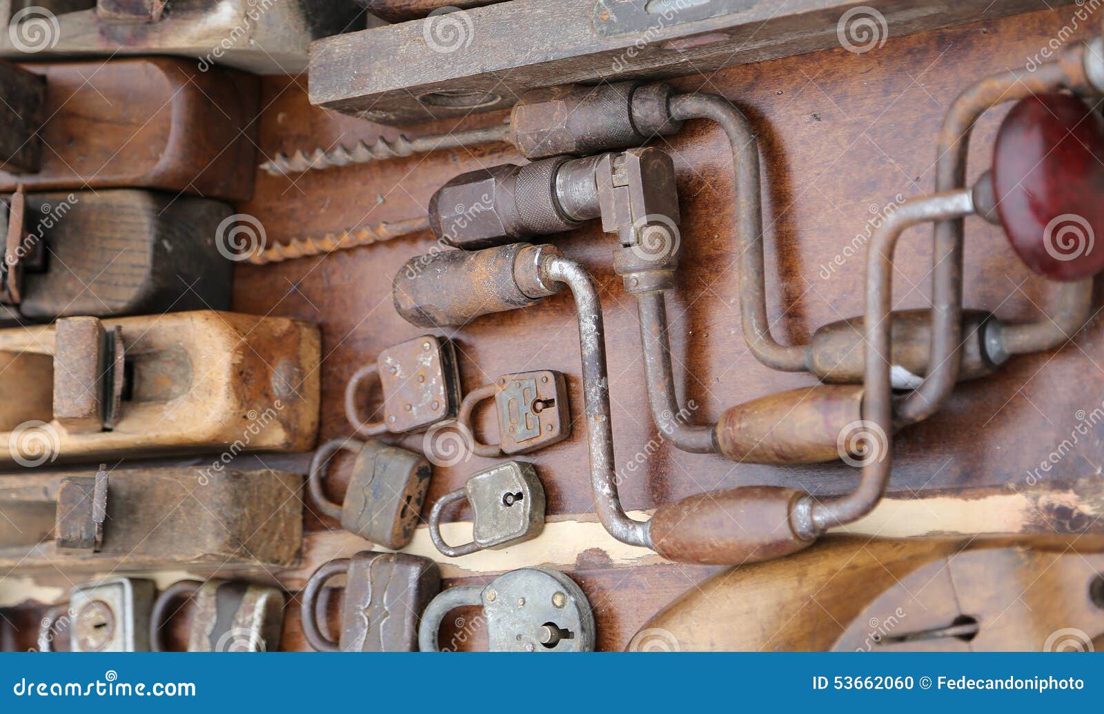 Hand Drill Old Rusty Padlocks and Planers in the Stand of Flea M Stock