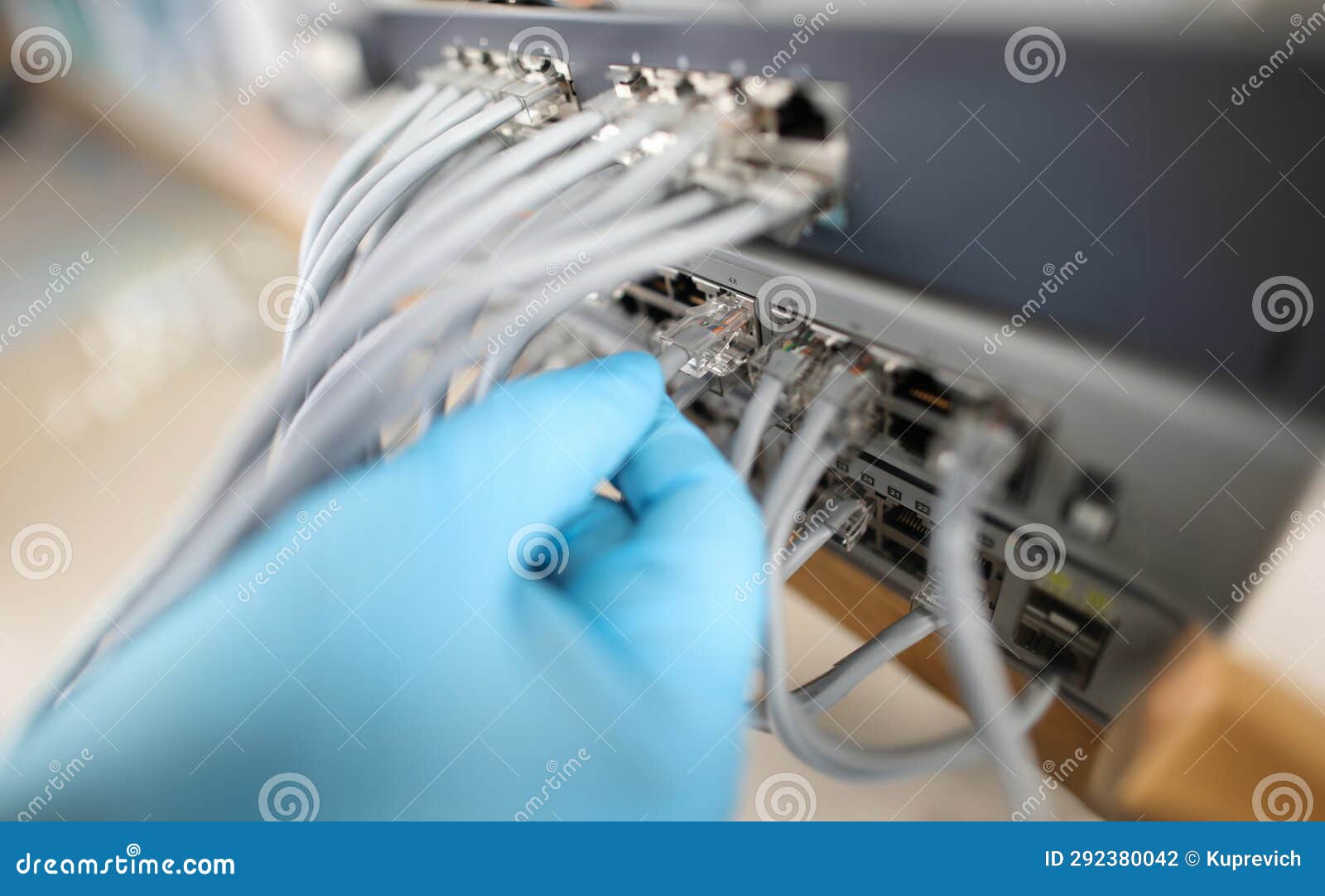hand of it engineer technician with lot of internet network cable in wireless system of server room