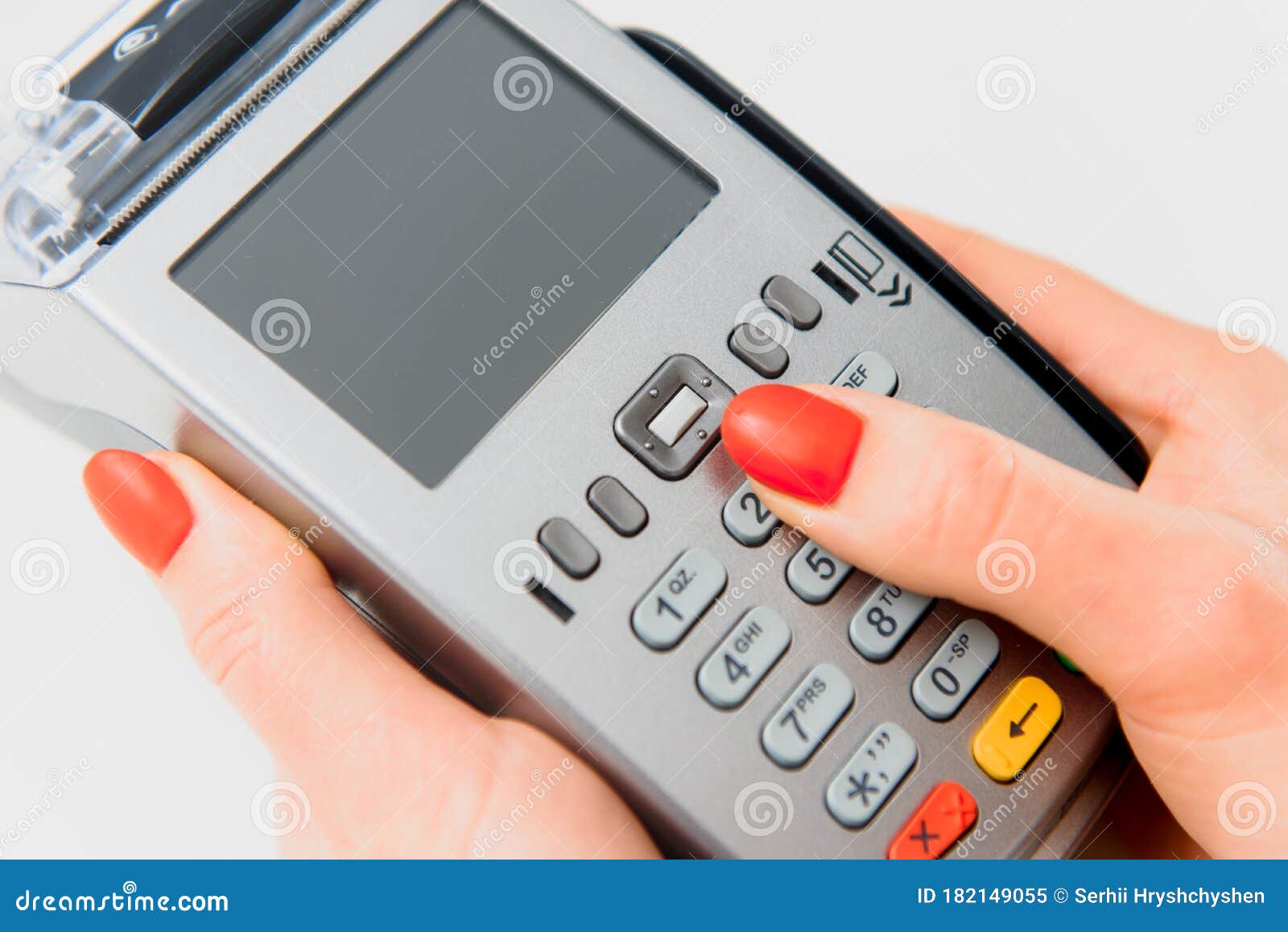 Hand and Fingers Entering Pin with a Hand Held Pin Pad Stock Image