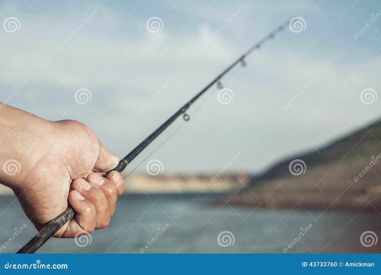 Hand with fishing Pole stock photo. Image of outdoor - 43733760