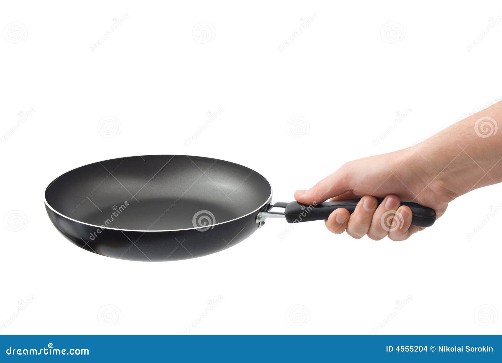 Hand And Frying Pan Stock Images - Image: 4555204