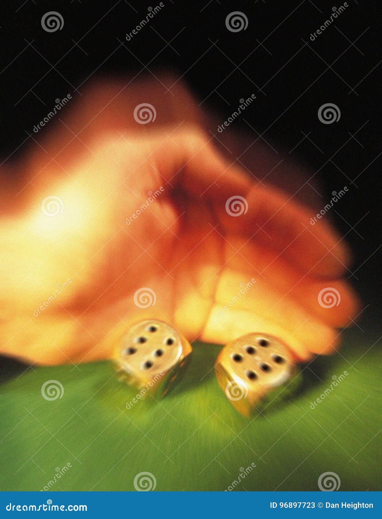 hand of gambler rolling dice