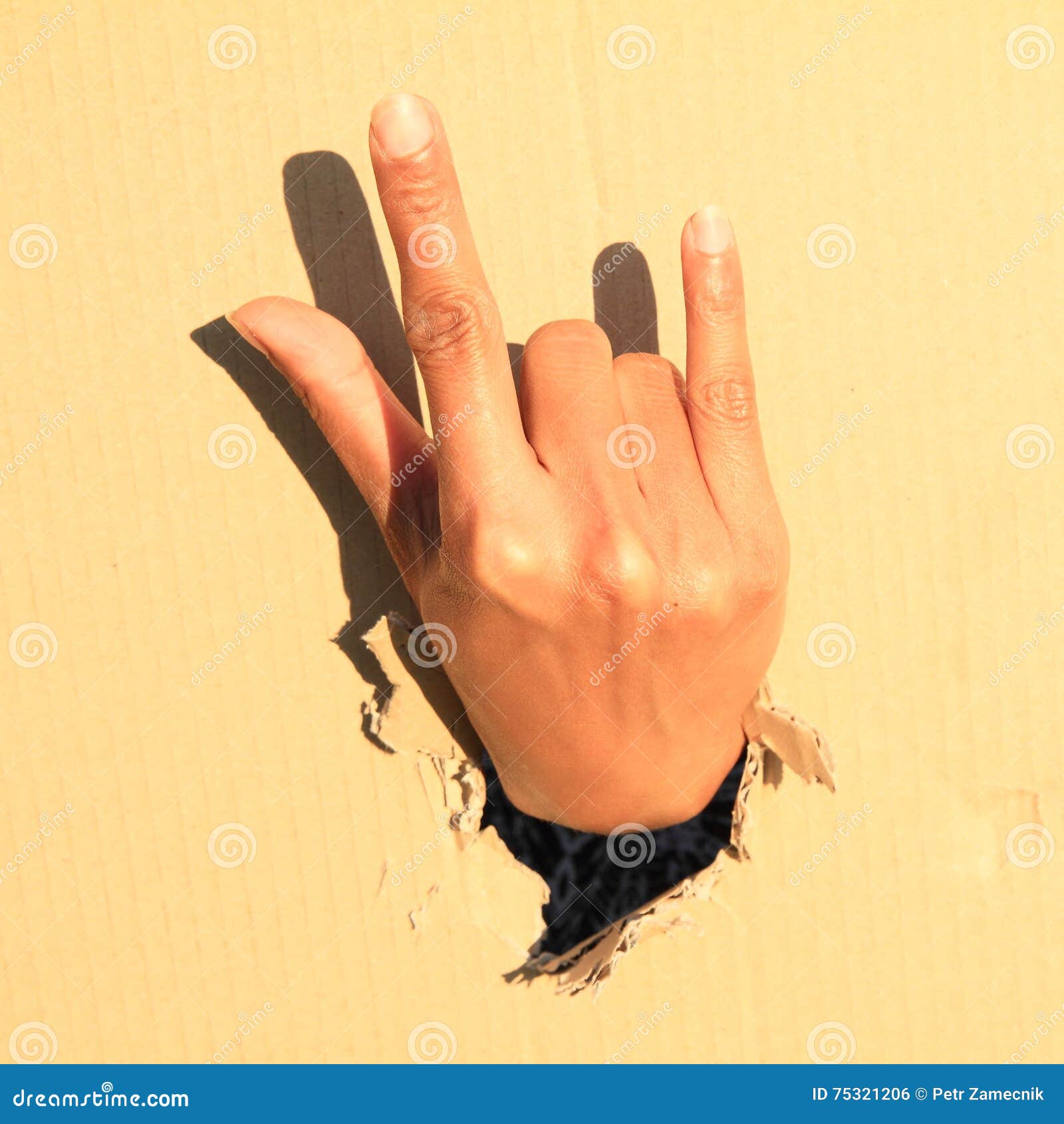 Hand with gesture cuckold stock photo