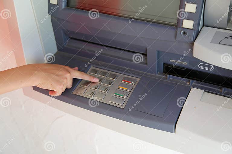 Hand Type the Secret Code in the ATMs Keyboard To Pick Up the Mo Stock