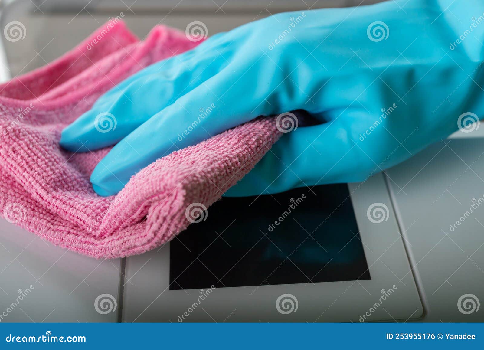 Hand in Glove Wipes Dust from a Printer with a Rag Stock Photo Image