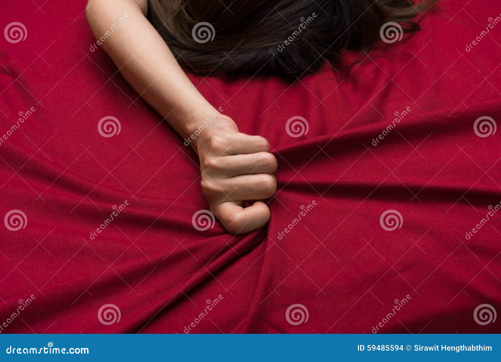 Hand grasp bed sheet stock photo. Image of fabric, hair 59485594