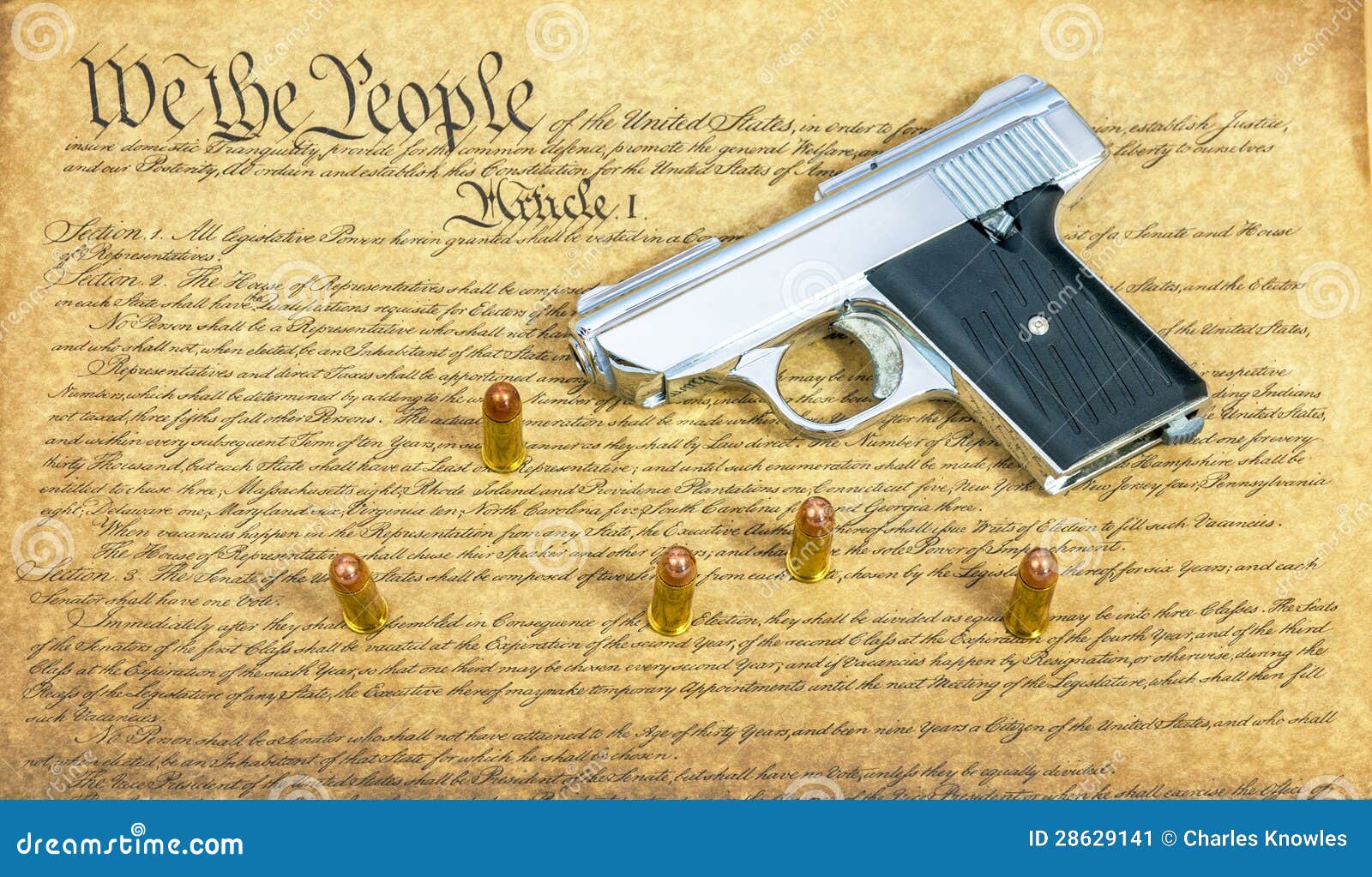 Hand gun on Constitution stock image. Image of firearm 28629141