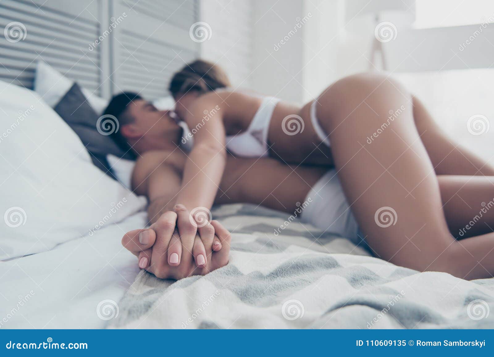 Hand in Hand, Hot Naughty Wife and Husband, Woman is on Top with Stock Image picture image