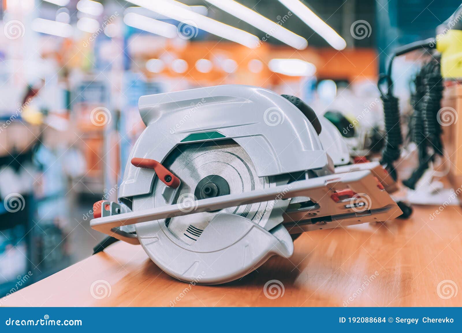 A Handheld Cutting Saw on a Shelf with Tools Stock Photo Image of
