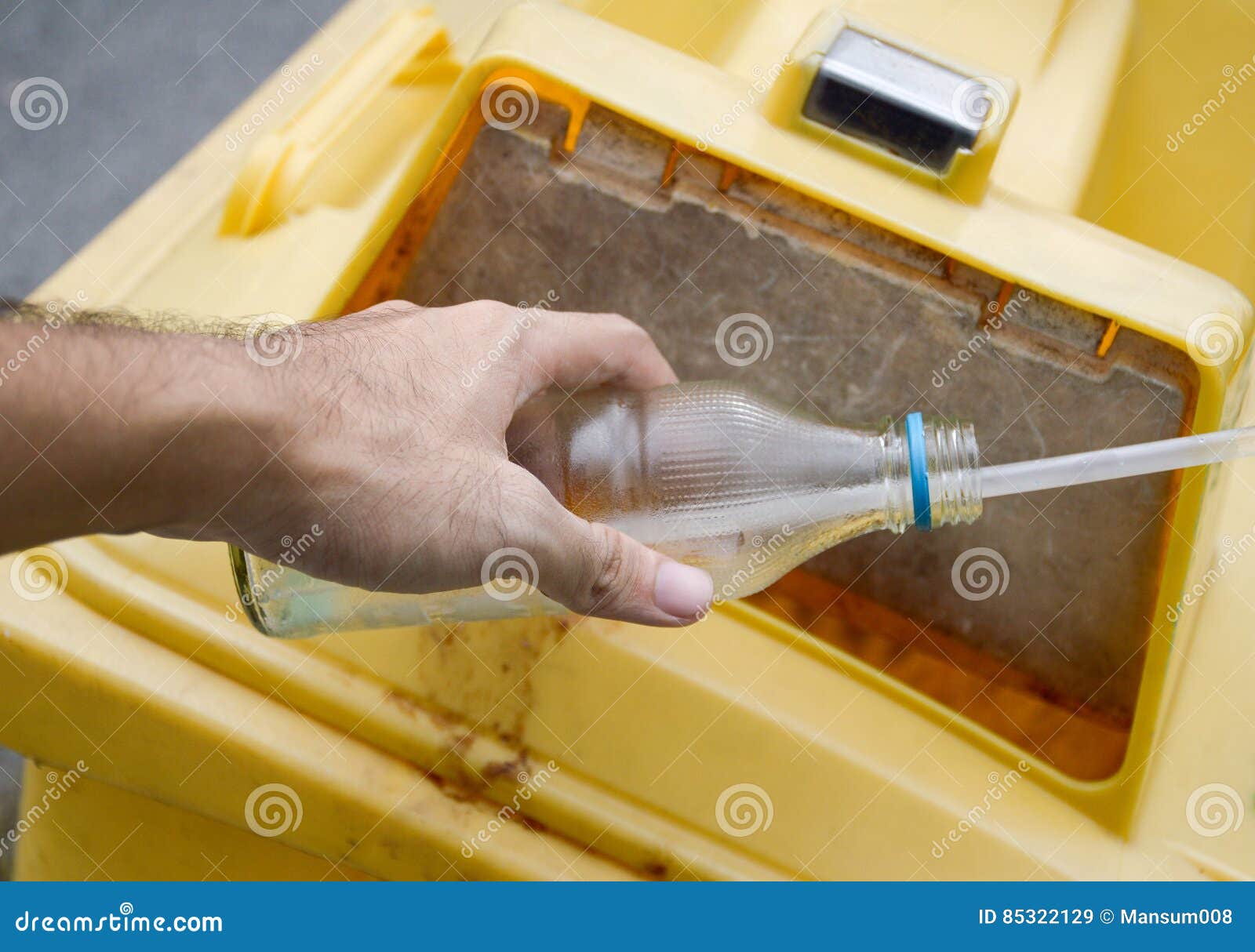 Hand Hold Glass Bottle on Yellow Bin Stock Image Image of disposal