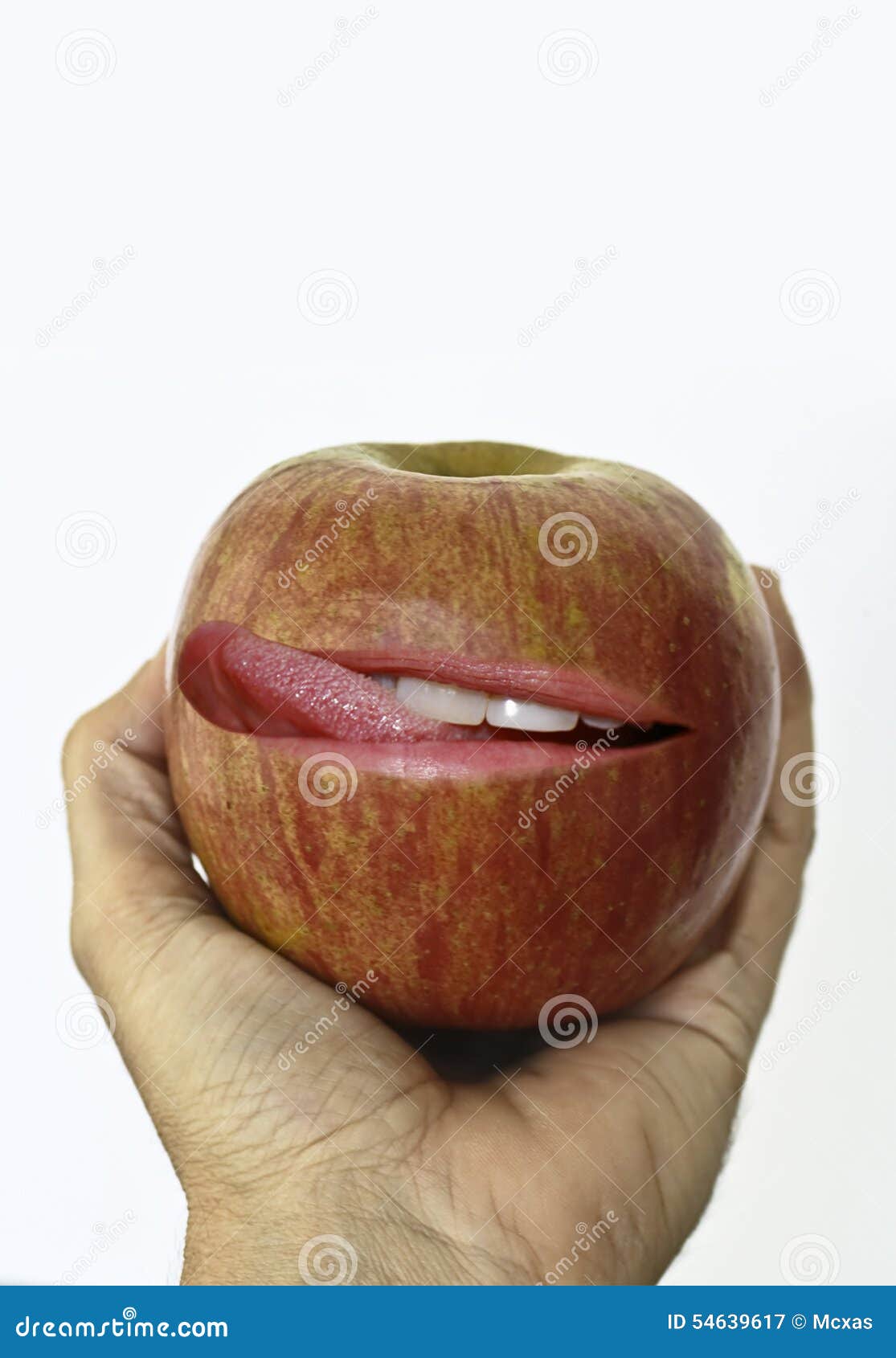 Hand Holding an Apple Smacking Lips Stock Image Image of sticking