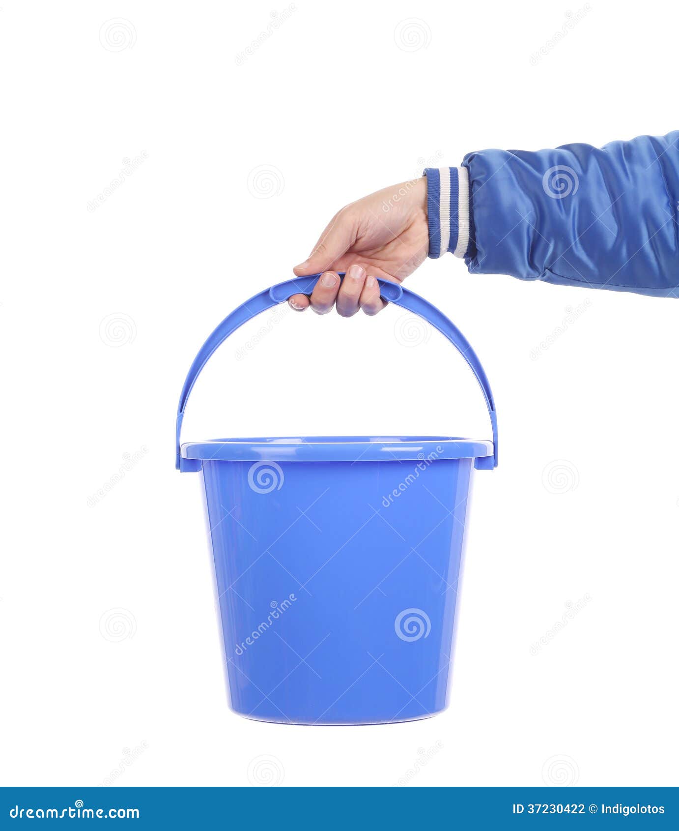 Hand holding blue bucket. stock photo. Image of vertical 37230422