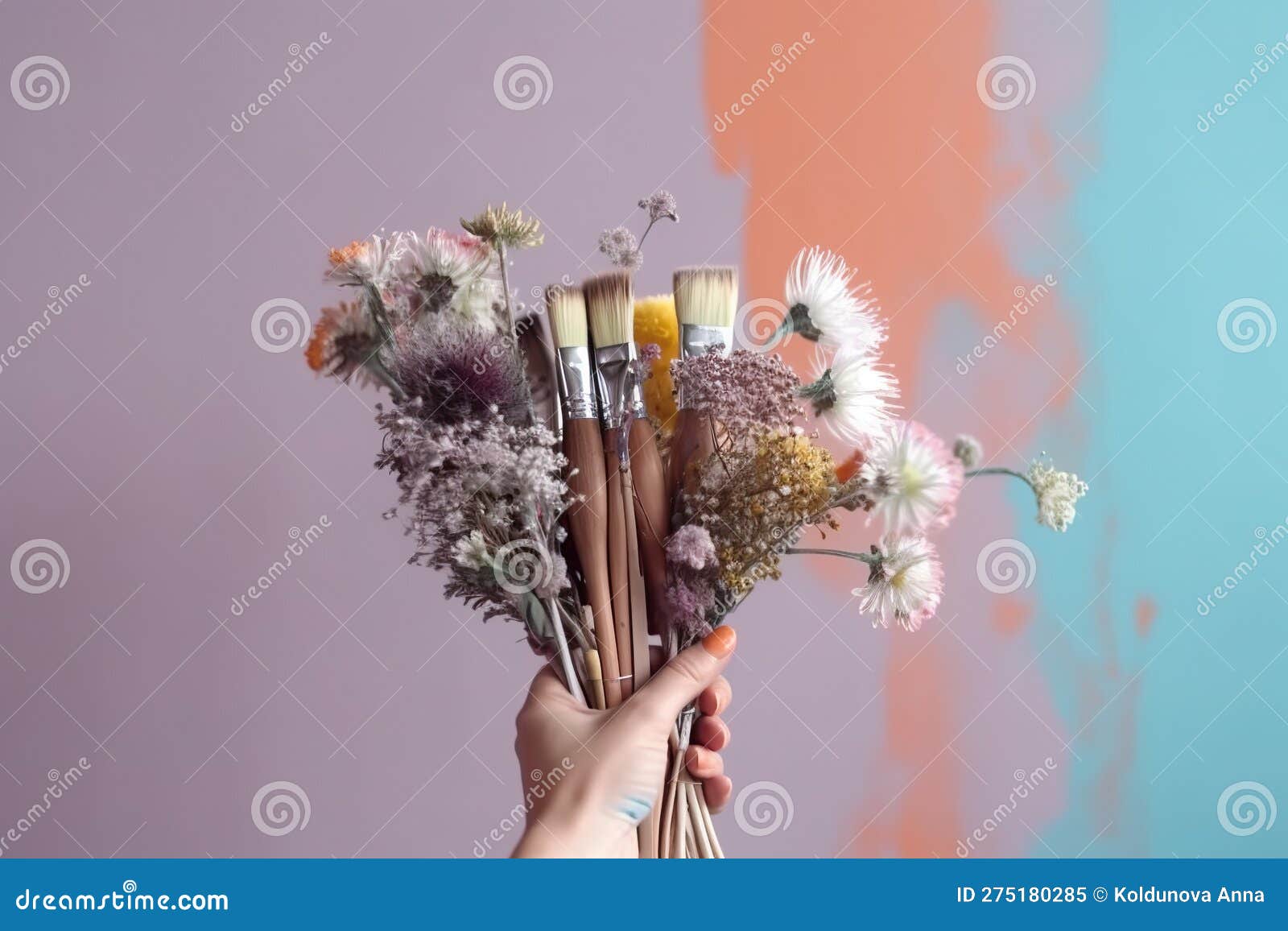 Hand Holding a Bouquet of Paint Brushes and Rollers Created with