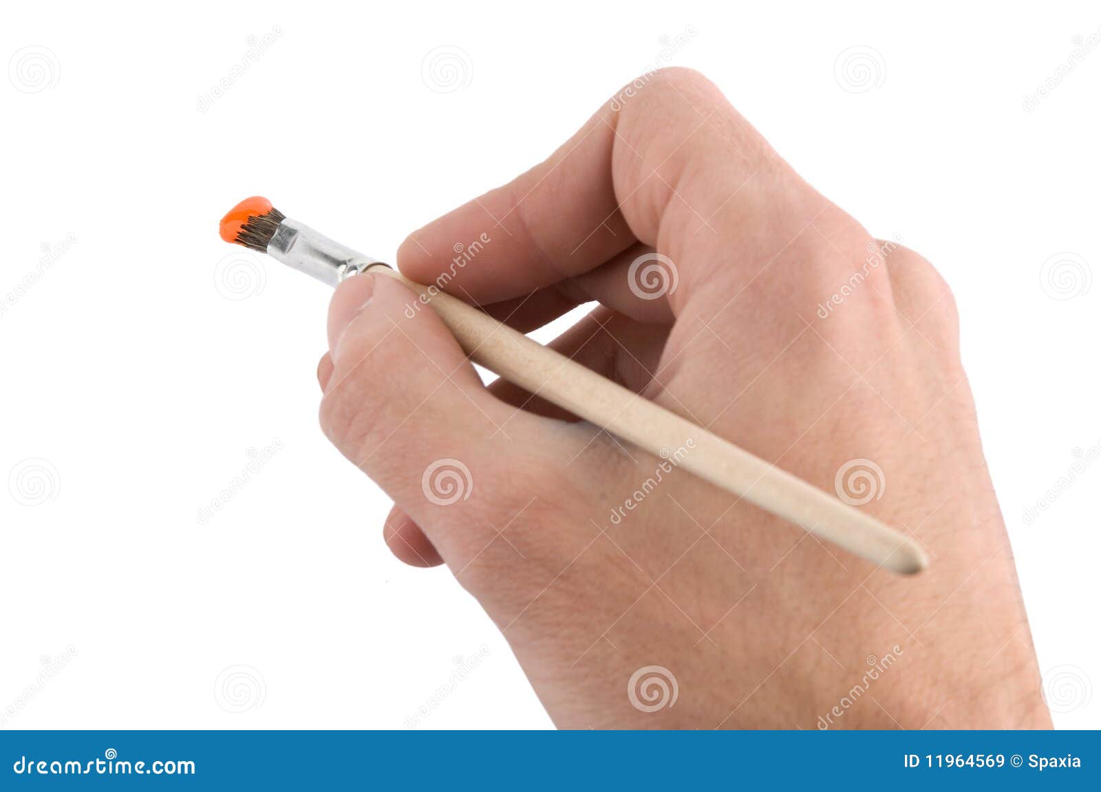 Hand holding a brush stock image. Image of closeup, human 11964569