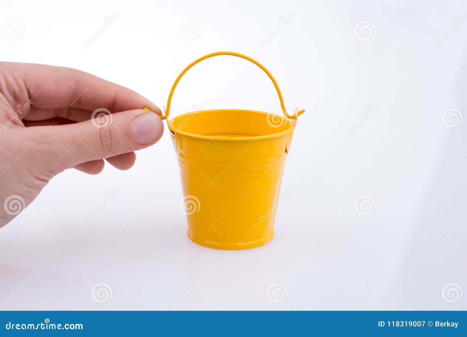Hand holding a bucket stock image. Image of housework 118319007