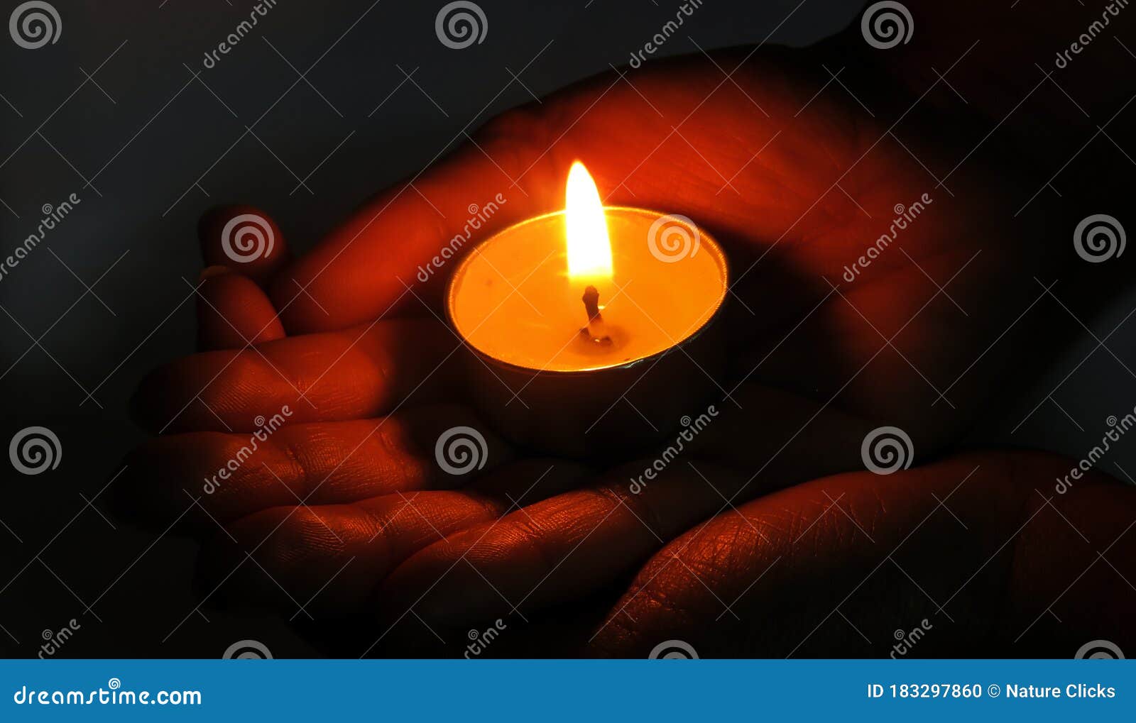 Hand Holding a Candle,Candle Light,Beautiful Candle in Hand Stock Photo