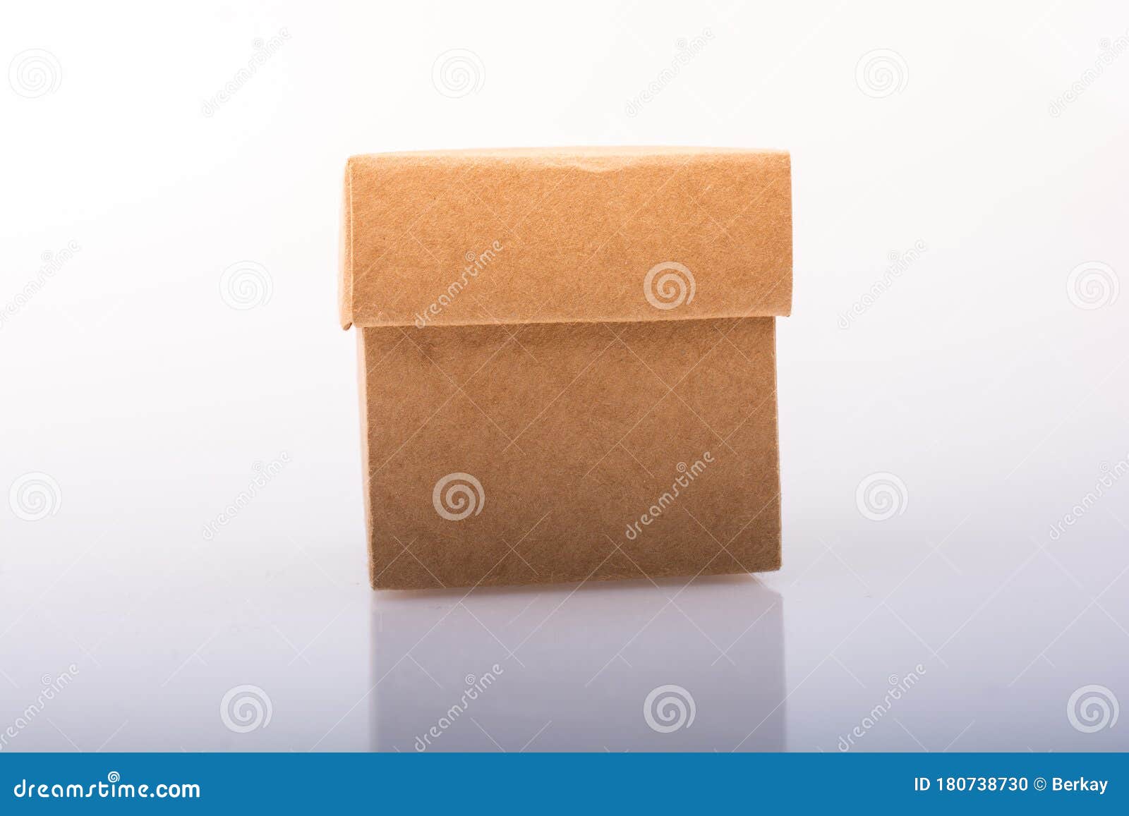 Hand Holding Cardboard Box on a Black Background Stock Photo Image of