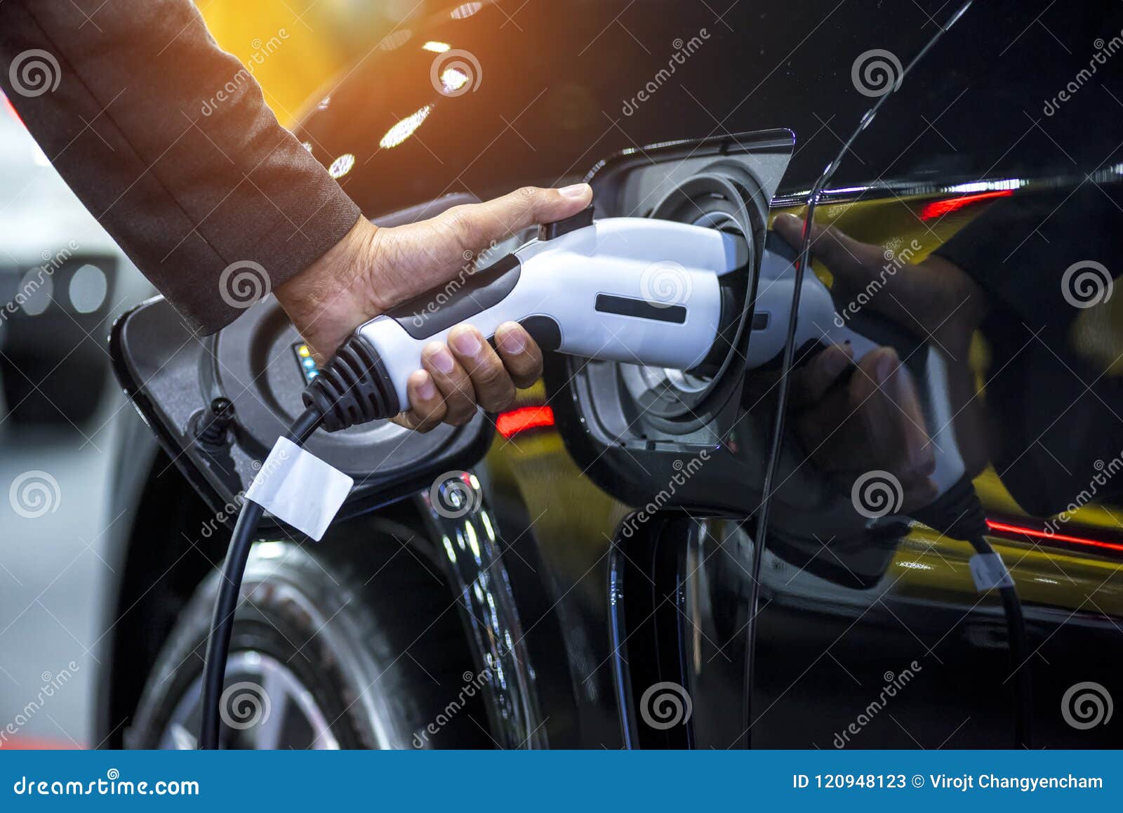 Hand Holding Charging Electric Car Battery Stock Image Image of hand