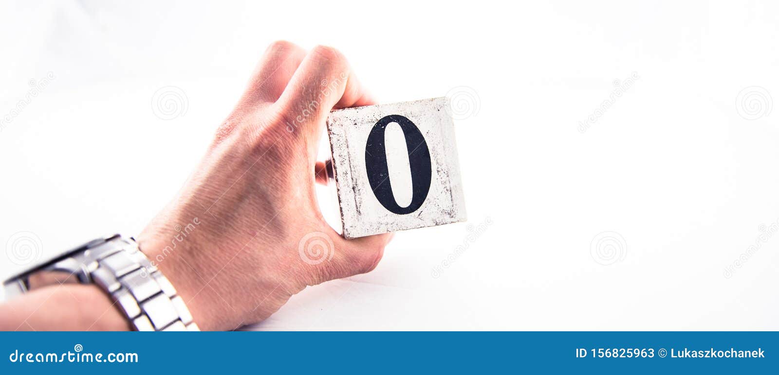A Hand Holding Digit Number 0 Zero On White Background Stock Image