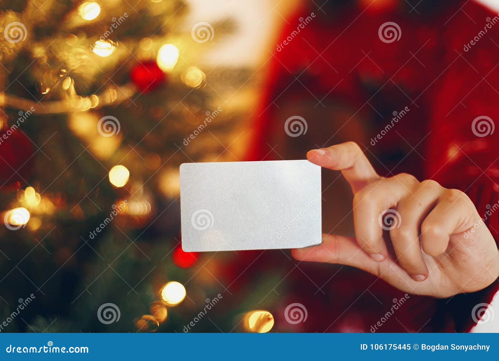 Hand Holding Empty Credit Card at Beautiful Christmas Tree Light Stock ...