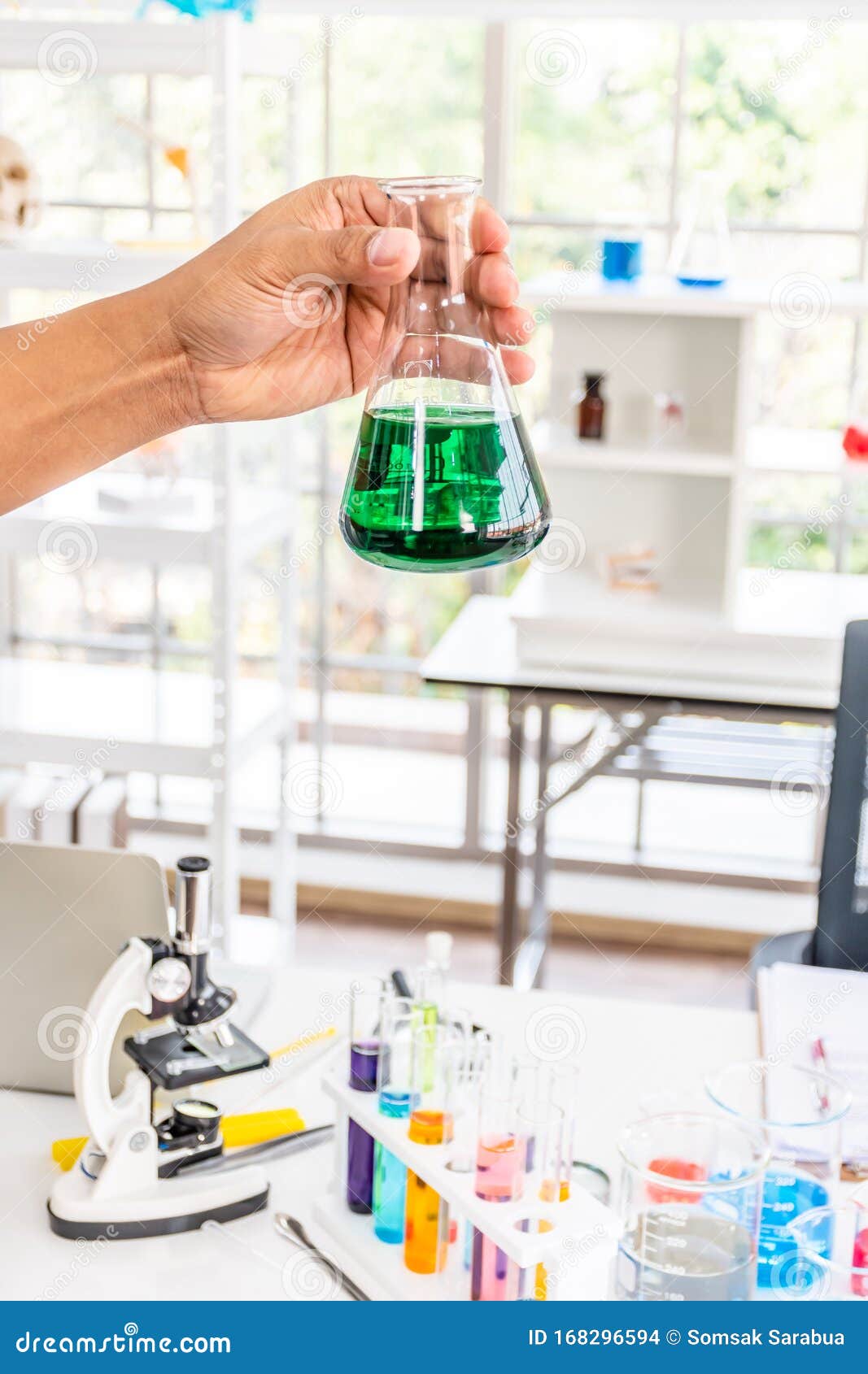 Hand Holding Glassware In The Science Laboratory Stock Photo Image of