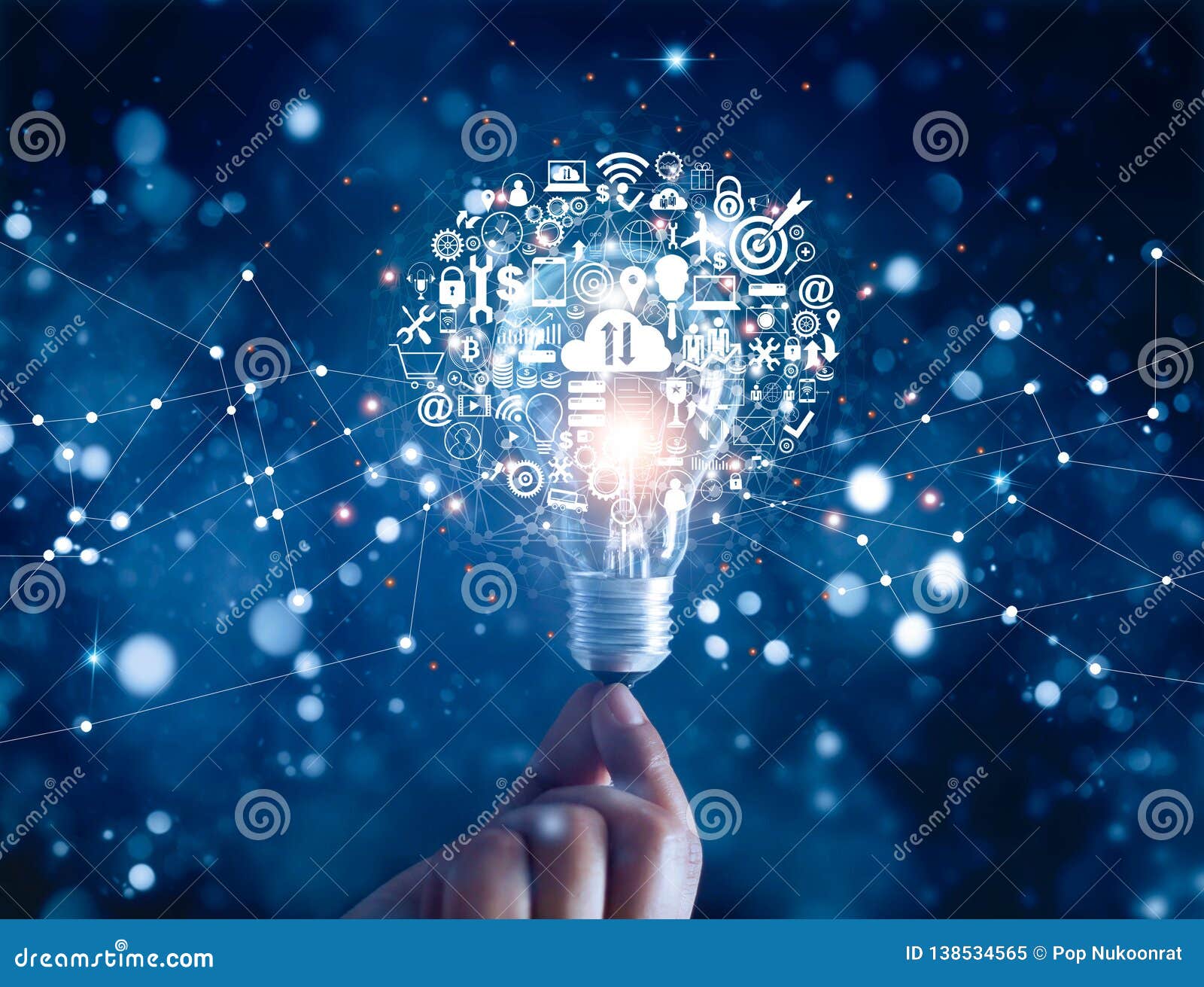 hand holding light bulb and business digital marketing innovation technology icons on network