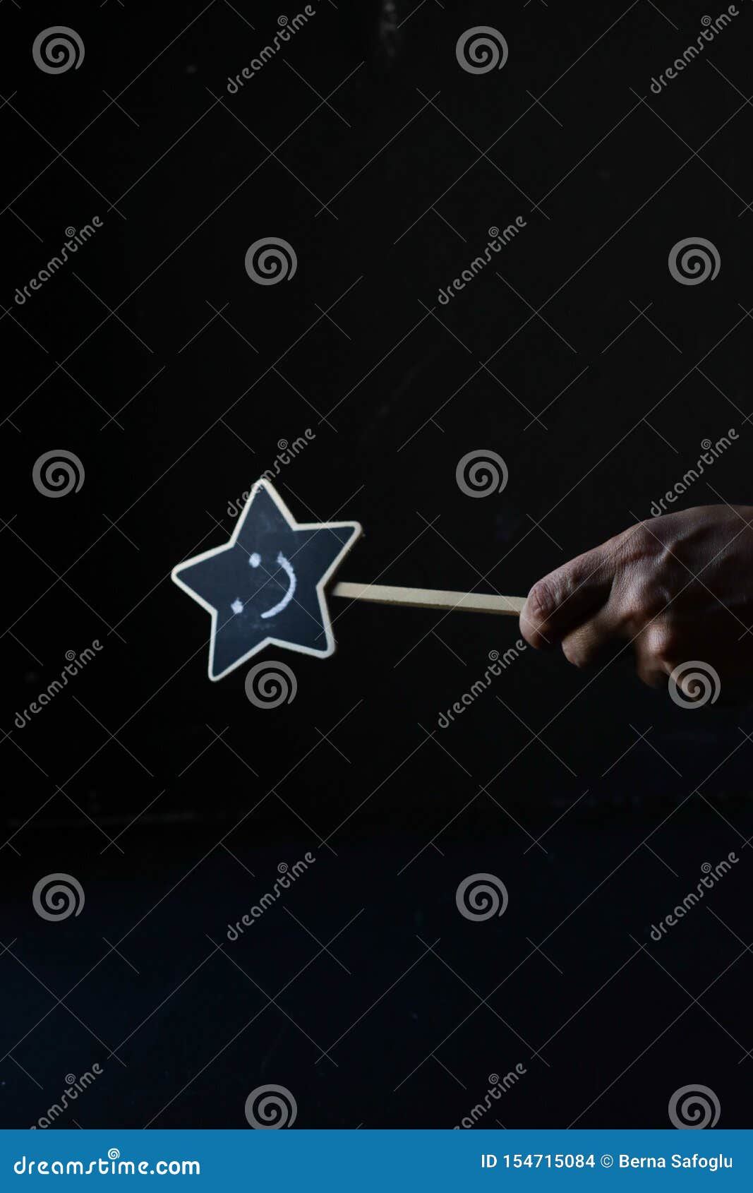 Hand Holding a Magic Wand with Smile Happy Face Stock Photo Image of