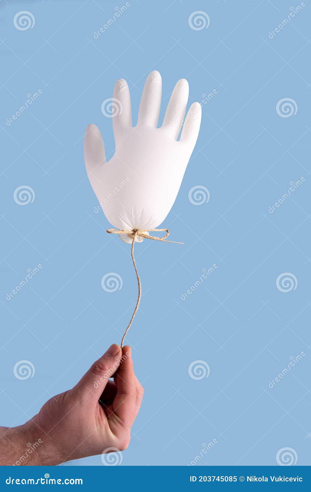 Hand Holding Glove Balloon Stock Image Image Of Care