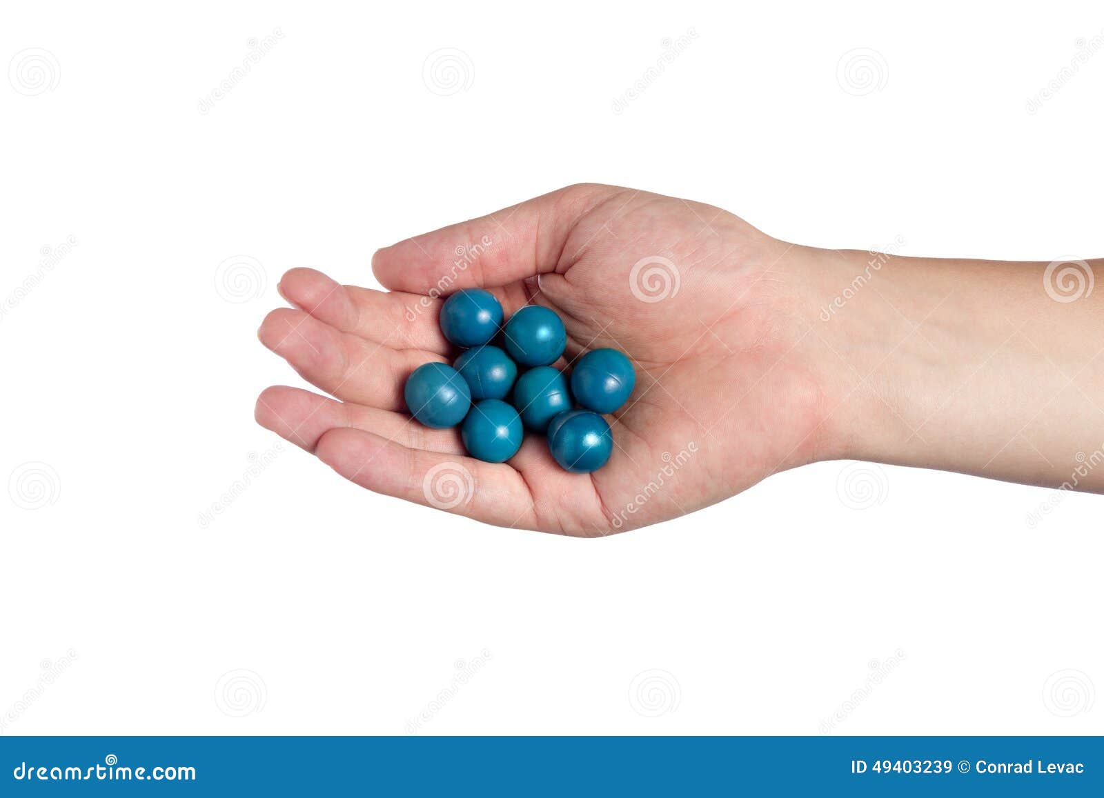 Hand Holding Paint Balls stock image. Image of paint - 49403239