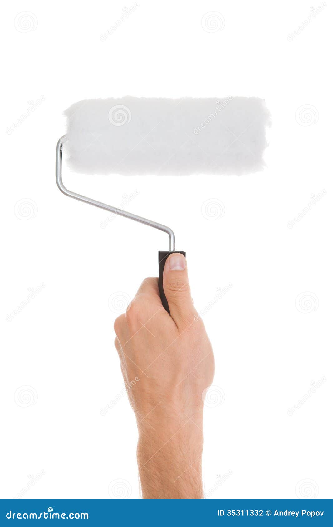Hand Holding Paint Roller stock photo. Image of happy 35311332