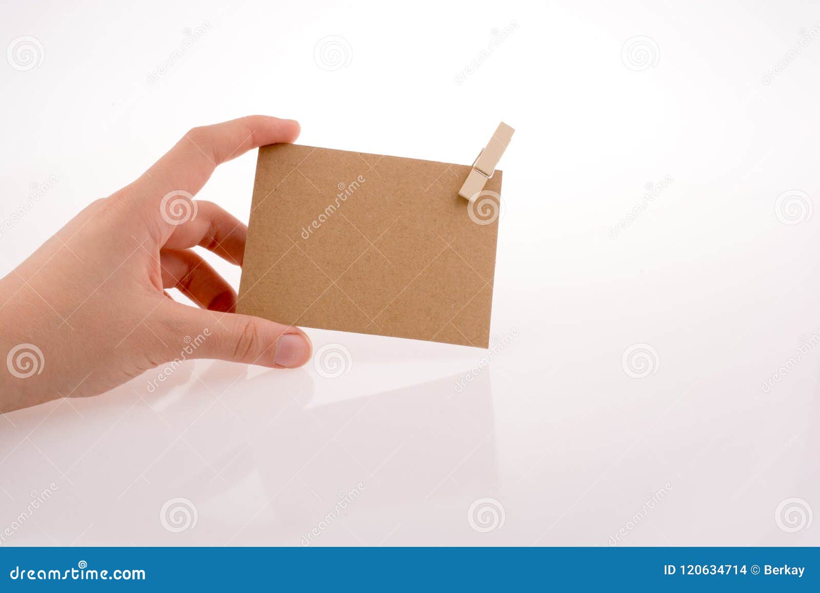 Hand holding paper stock photo. Image of background 120634714