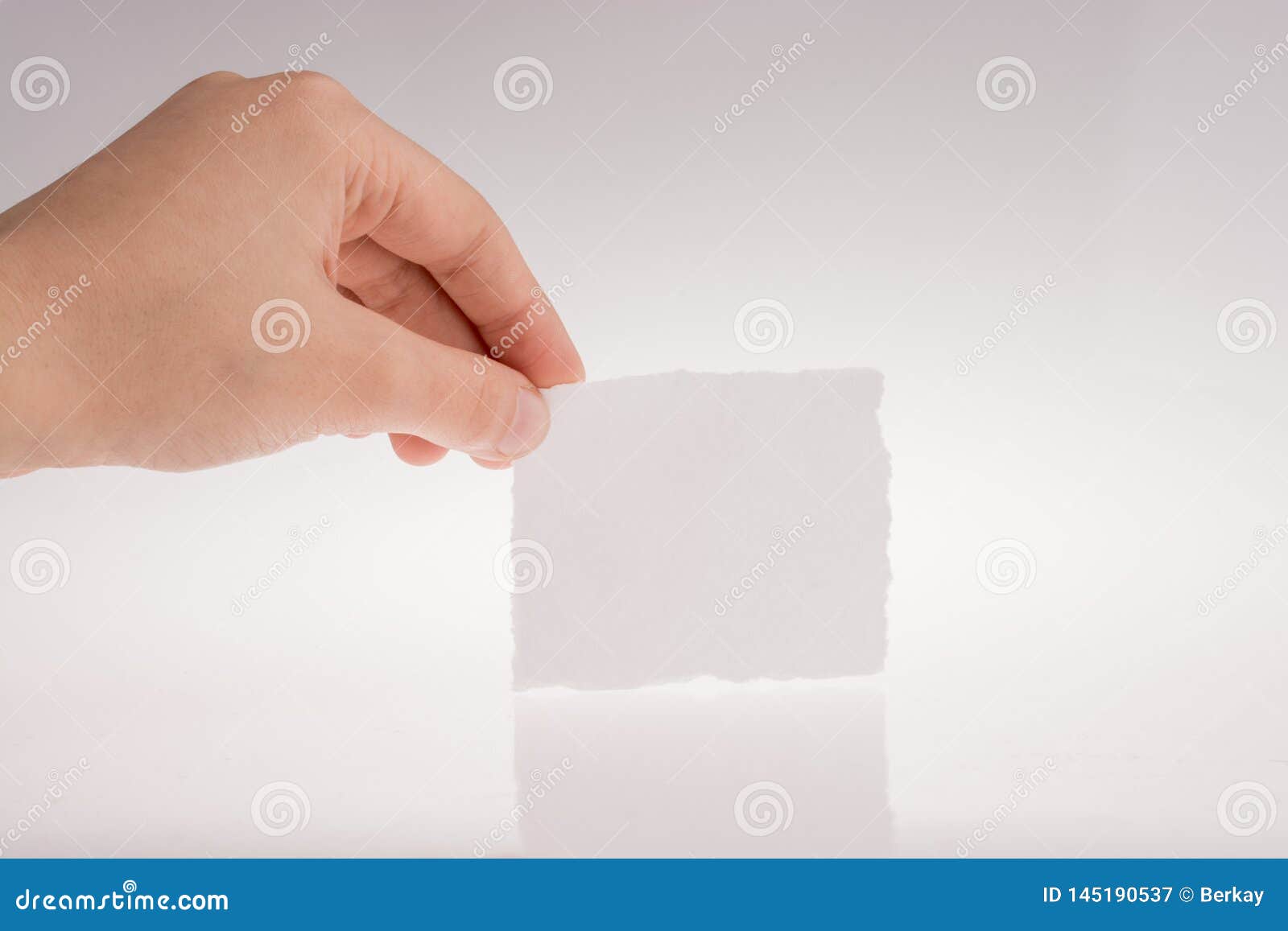Hand Holding a Piece of Paper Stock Image Image of pieces, piece 145190537