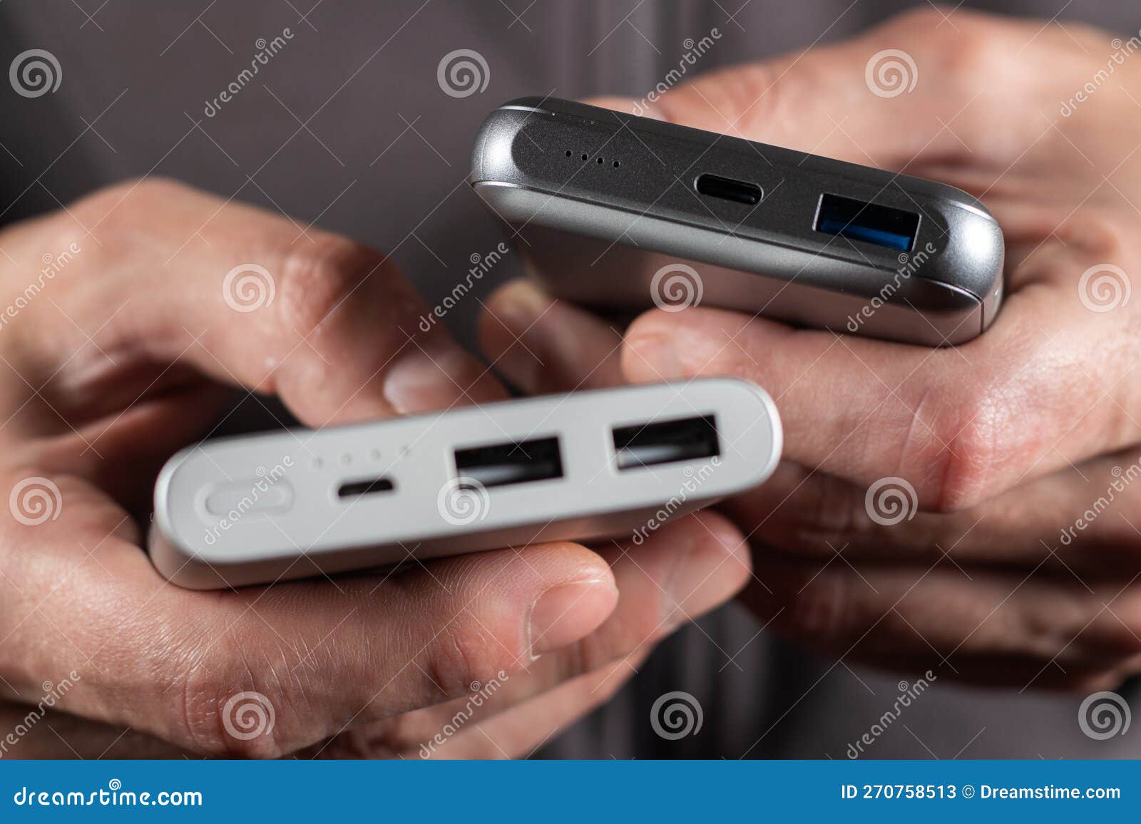 Hand Holding Powerbank for Charging Mobile Devices Stock Image Image