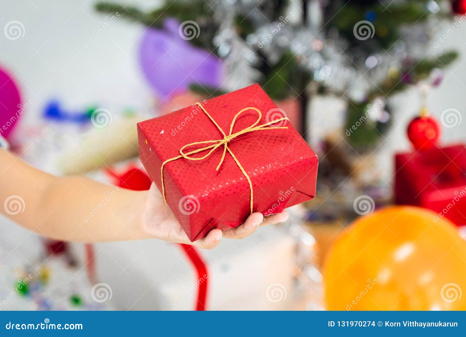 Hand Holding Present Gift Box Stock Photo Image of boys, gift 131970274