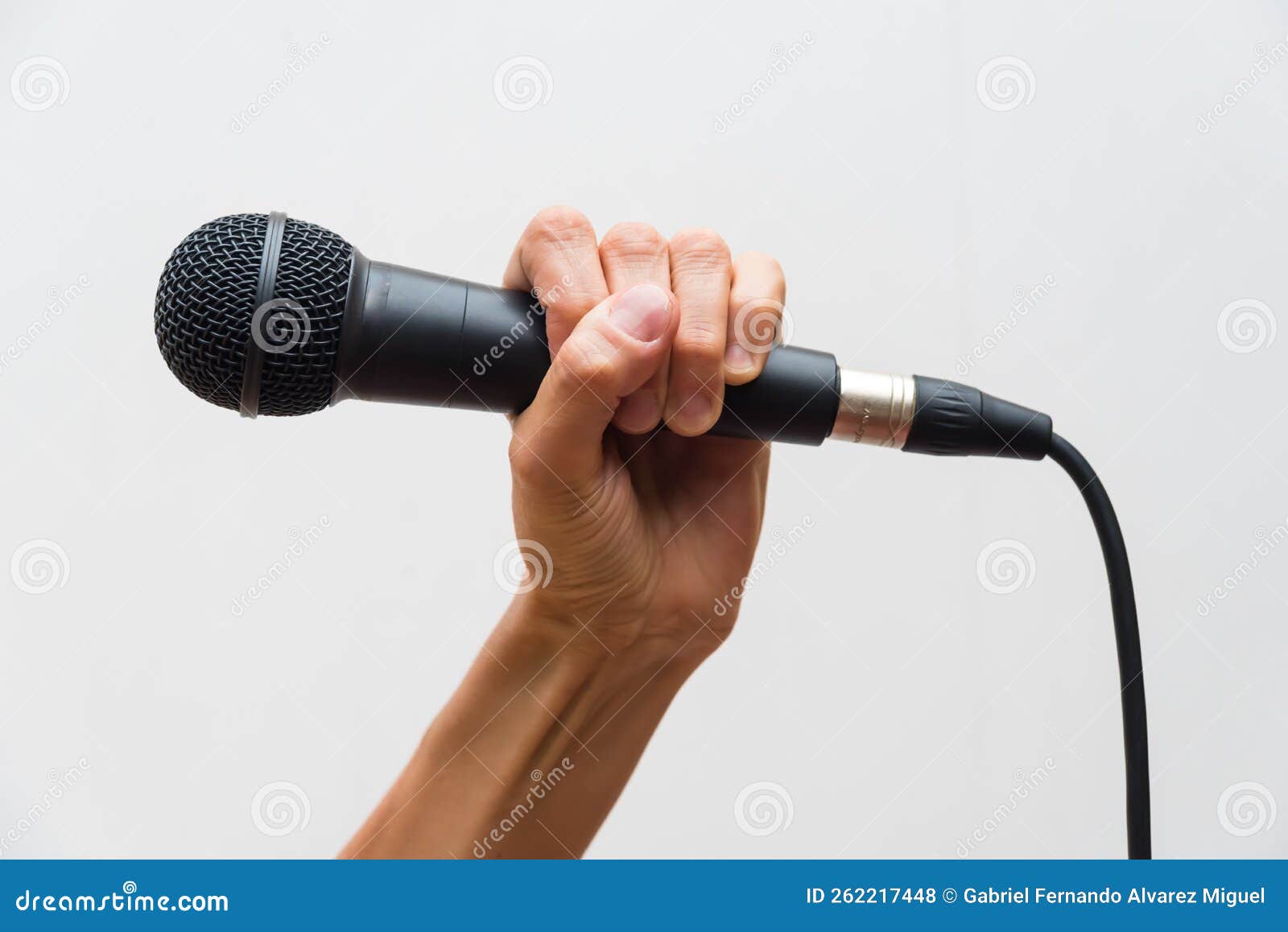 Hand Holding a Professional Wired Microphone Stock Photo Image of