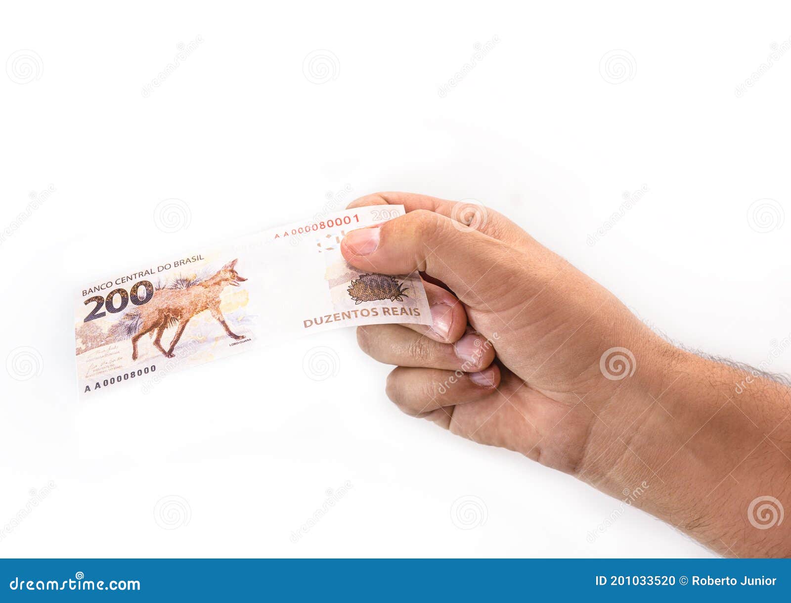 hand holding 200 reais bills, brazilian money, fgts concept, emergency aid portion, or economy of brazil