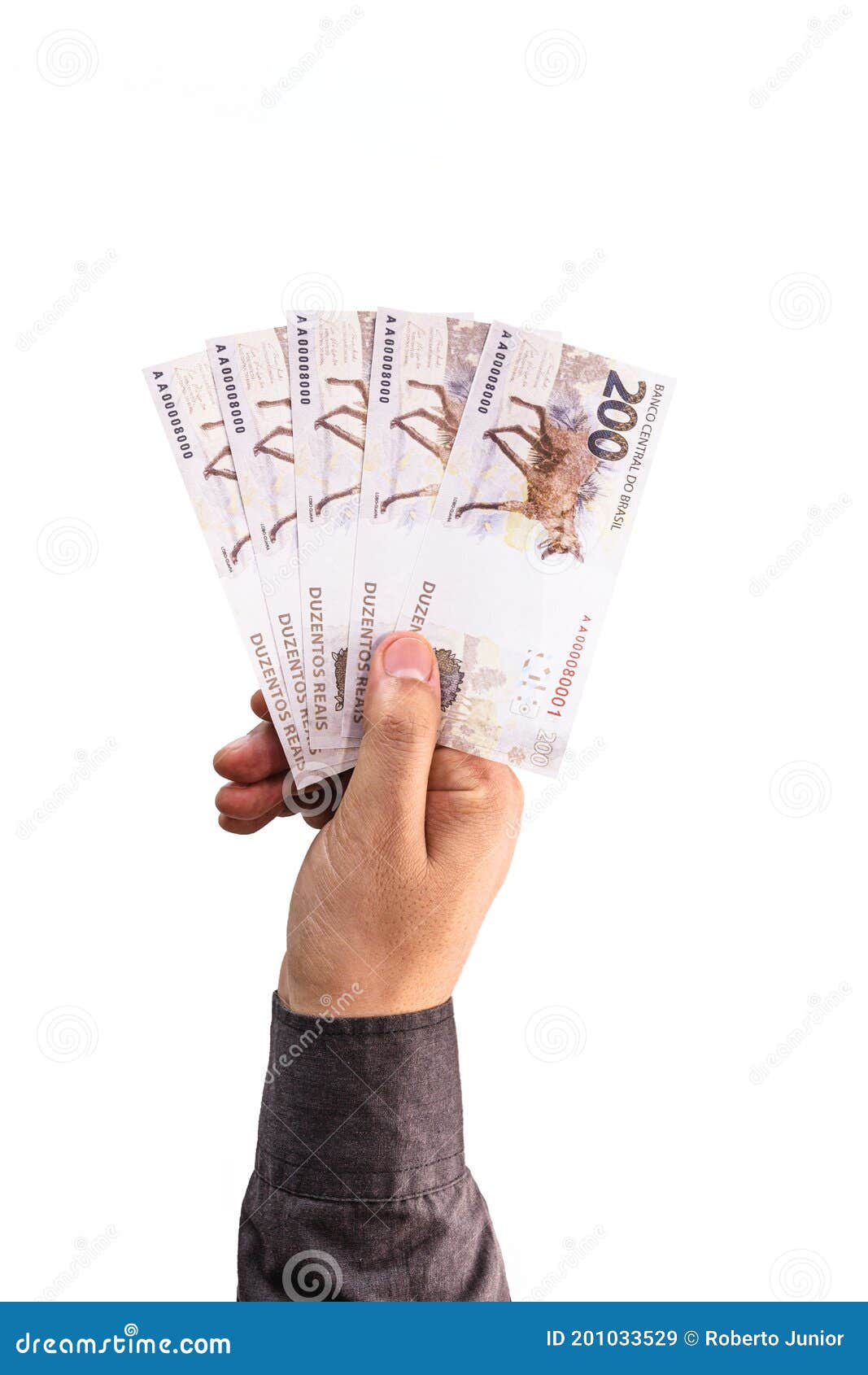 hand holding 200 reais bills, brazilian money, fgts concept, emergency aid portion, or economy of brazil