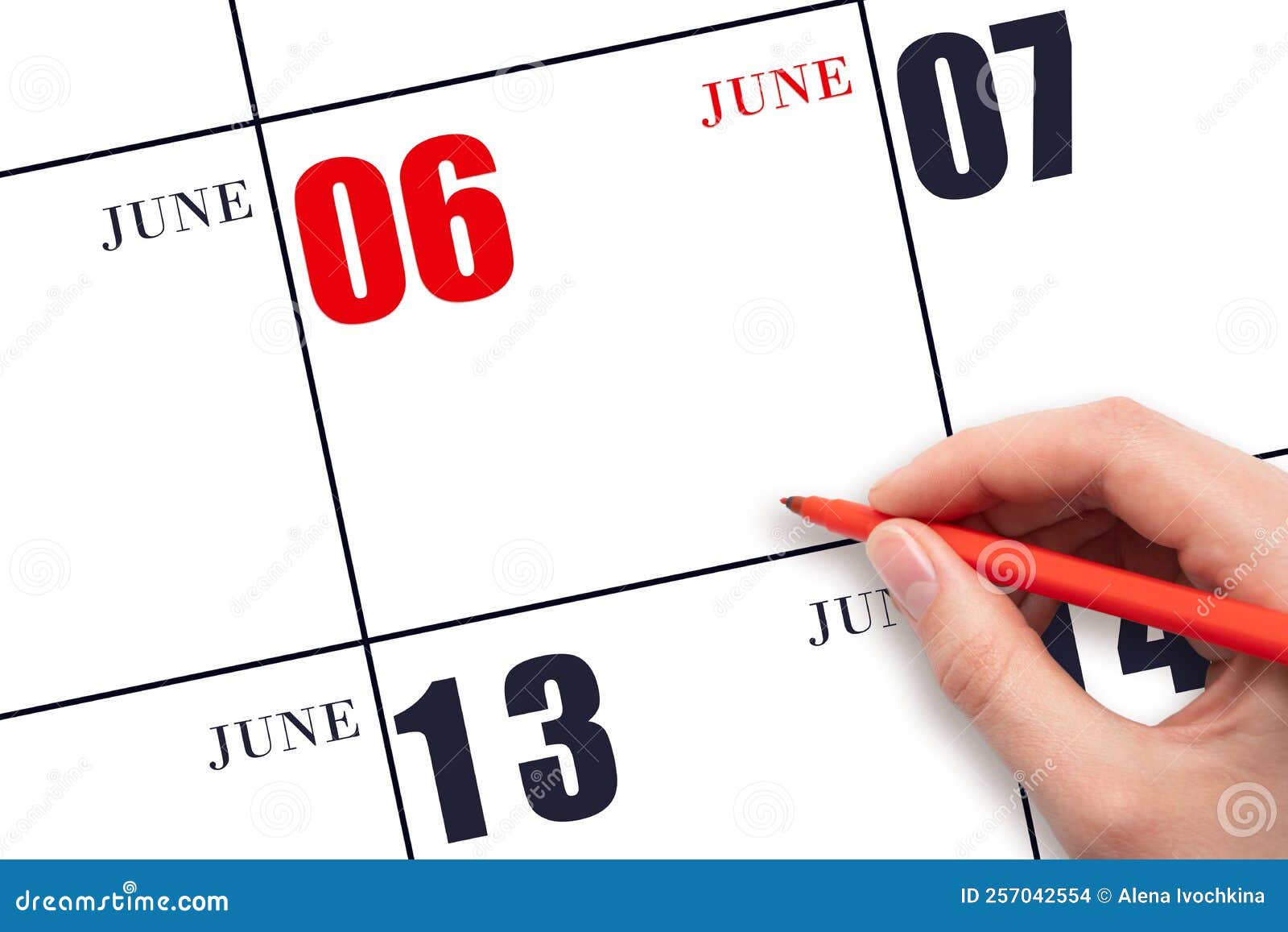 A Hand Holding a Red Pen and Pointing on the Calendar Date June 6. Red